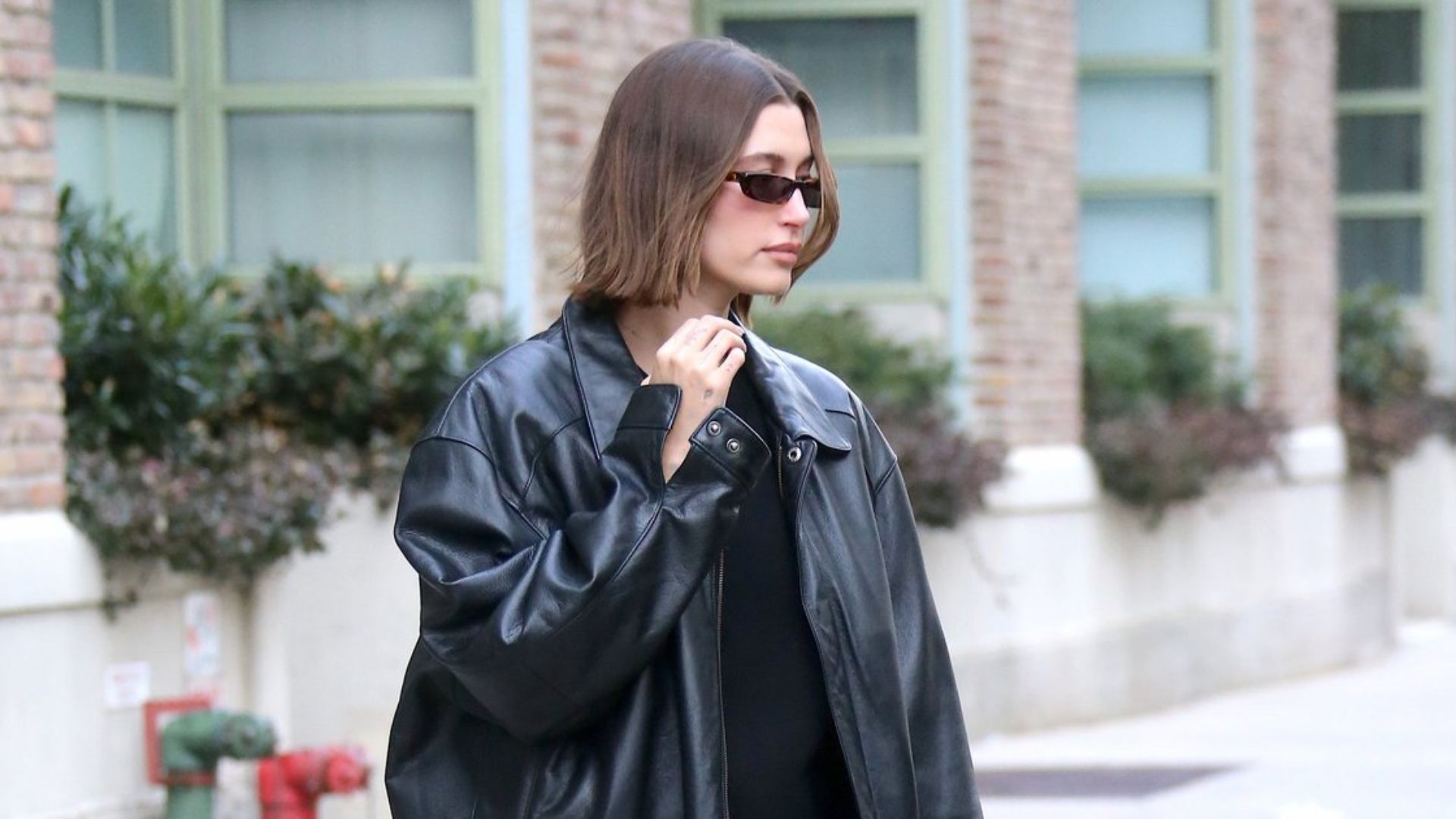 Hailey Bieber oversized leather jacket street style