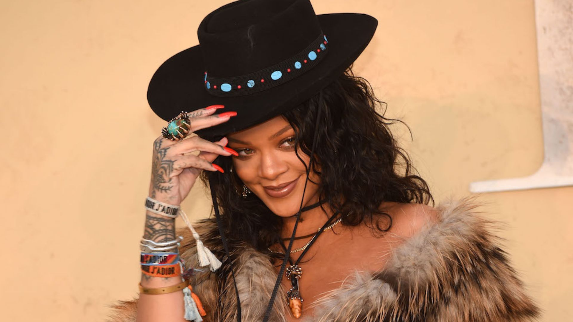 Rihanna faux fur coat street style