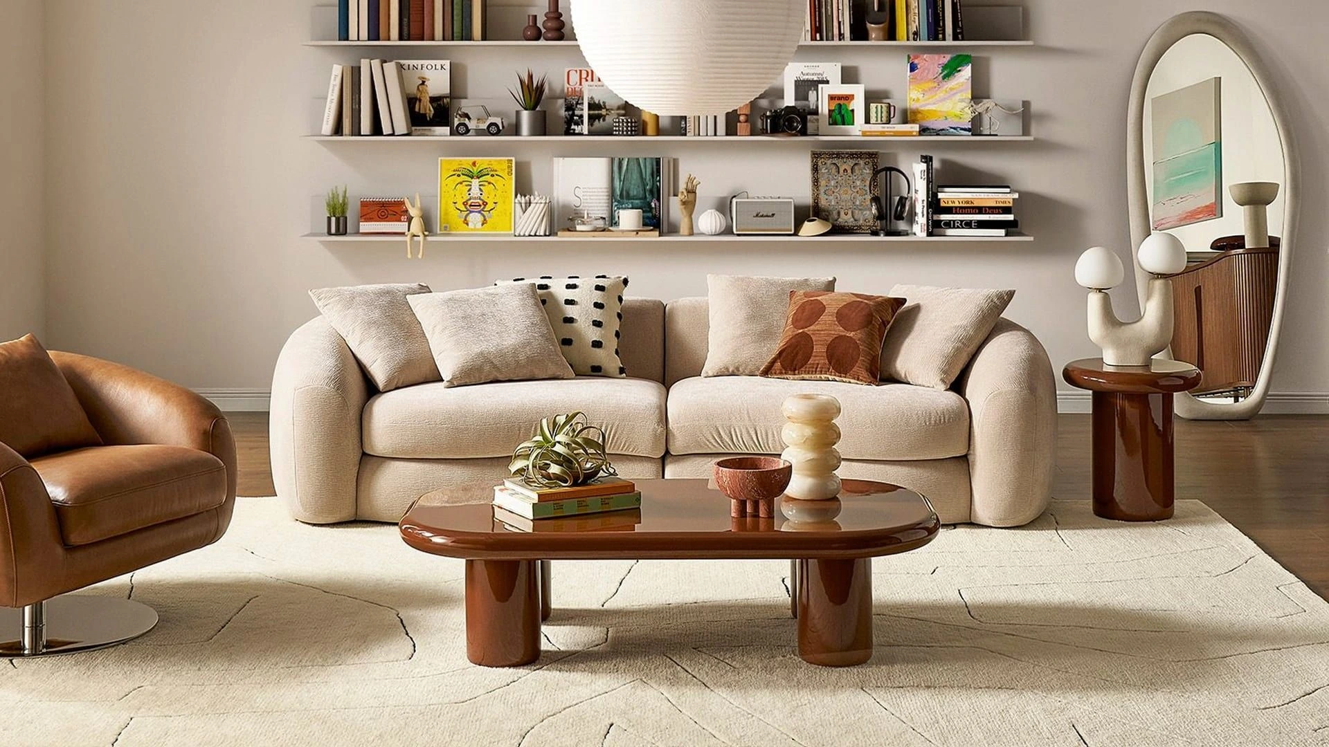 Castlery modern living room furniture including sofa, coffee table, and home décor